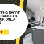 Connected smart kitchen gadgets on a countertop including coffee maker, smart oven, and hub device
